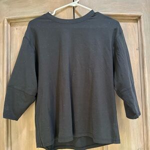 Lululemon Athletica black shirt with tiny colored speck design  (size 4)